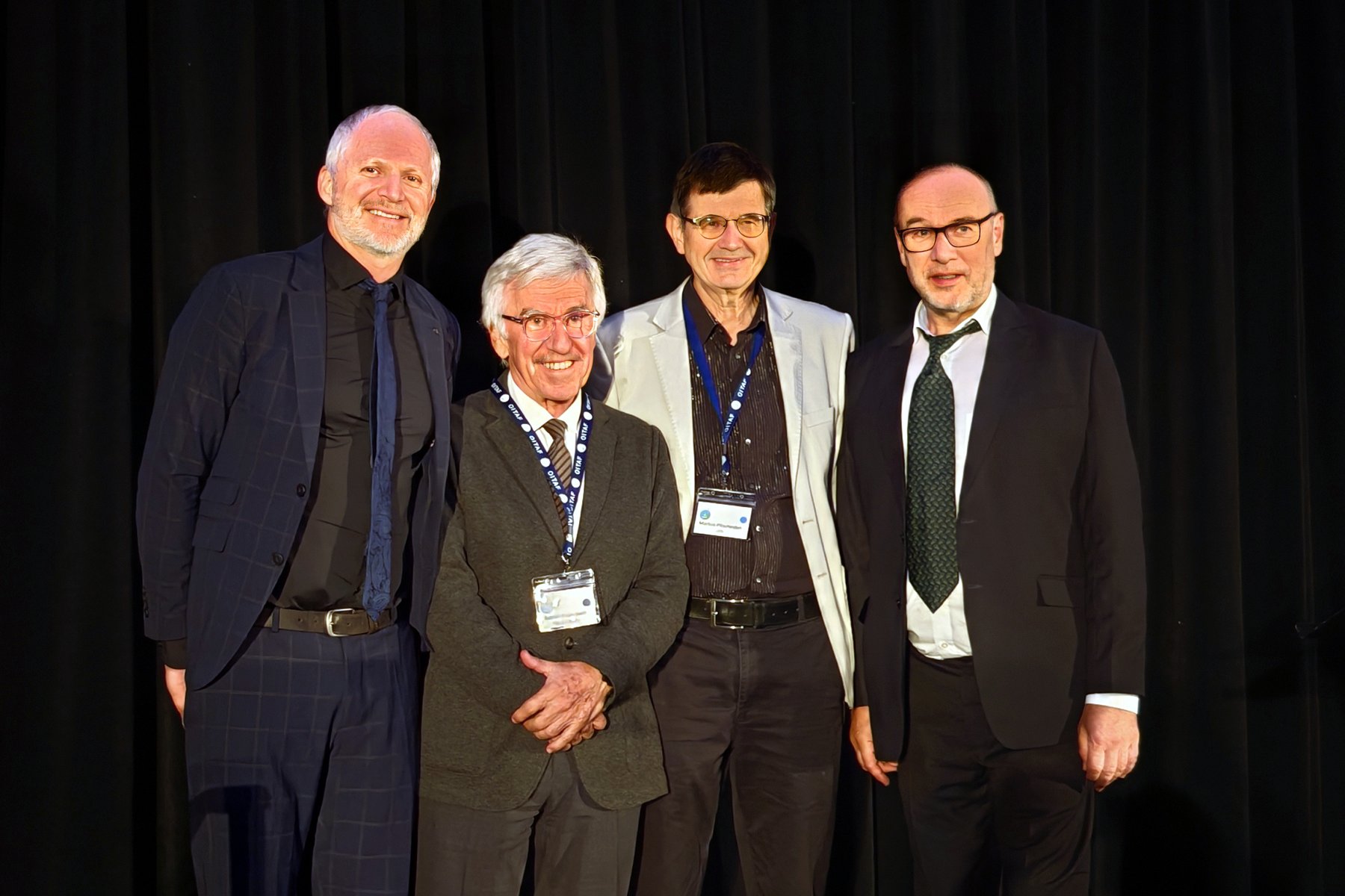 Von links nach rechts der neue Generalsekretär Nicola Barbolini, der neue Präsident Aureli Bisbe, der scheidende Generalsekretär Markus Pitscheider und der scheidende Präsident Jörg Schröttner Foto  © ISR